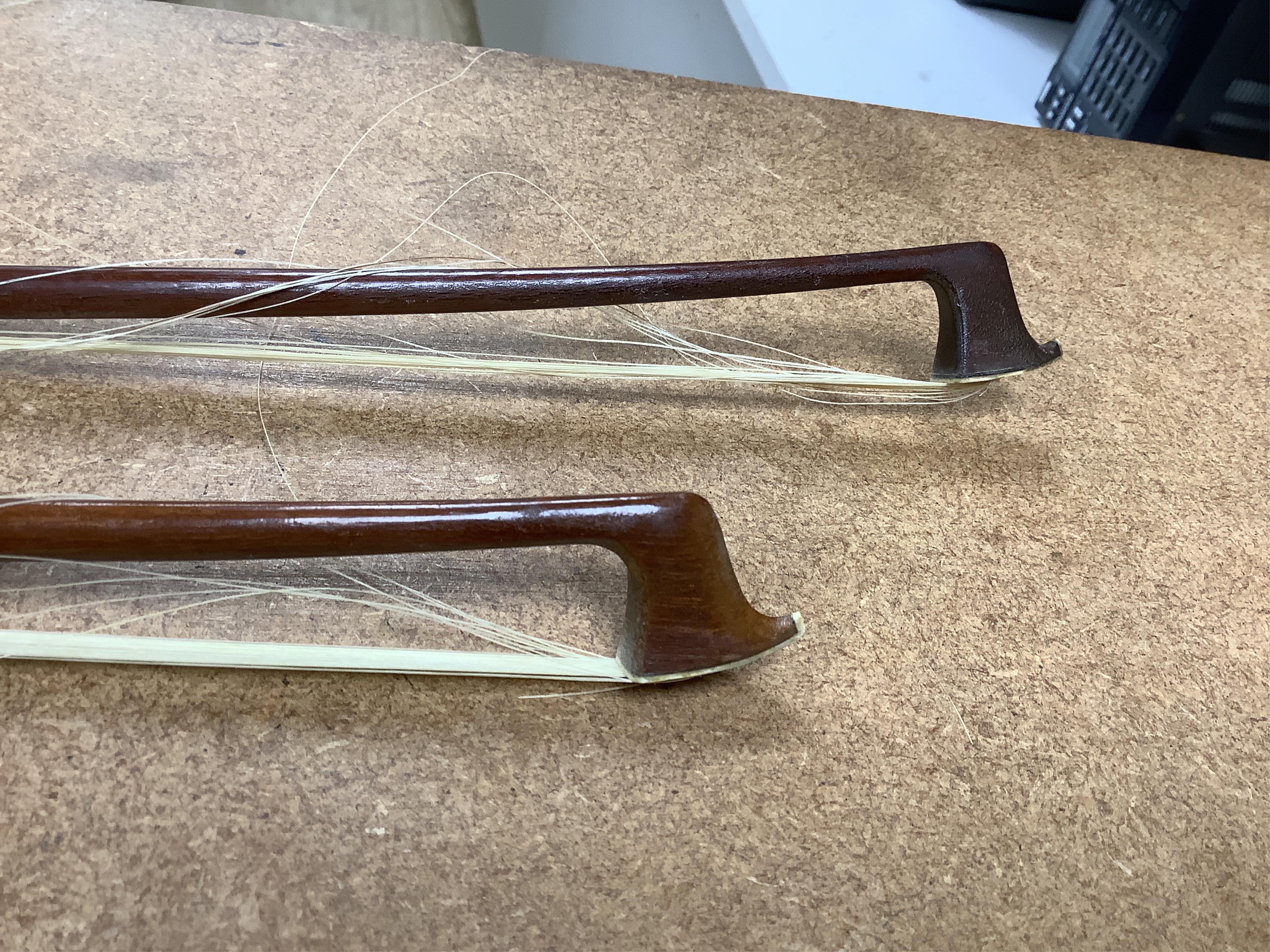 A late 19th century German violin in a Hill & Son oak case, with Hill canvas slip cover, together with an unbranded silver mounted bow, and another, ivory submission ref: 9HJU3B45 and ZC2E1GCP